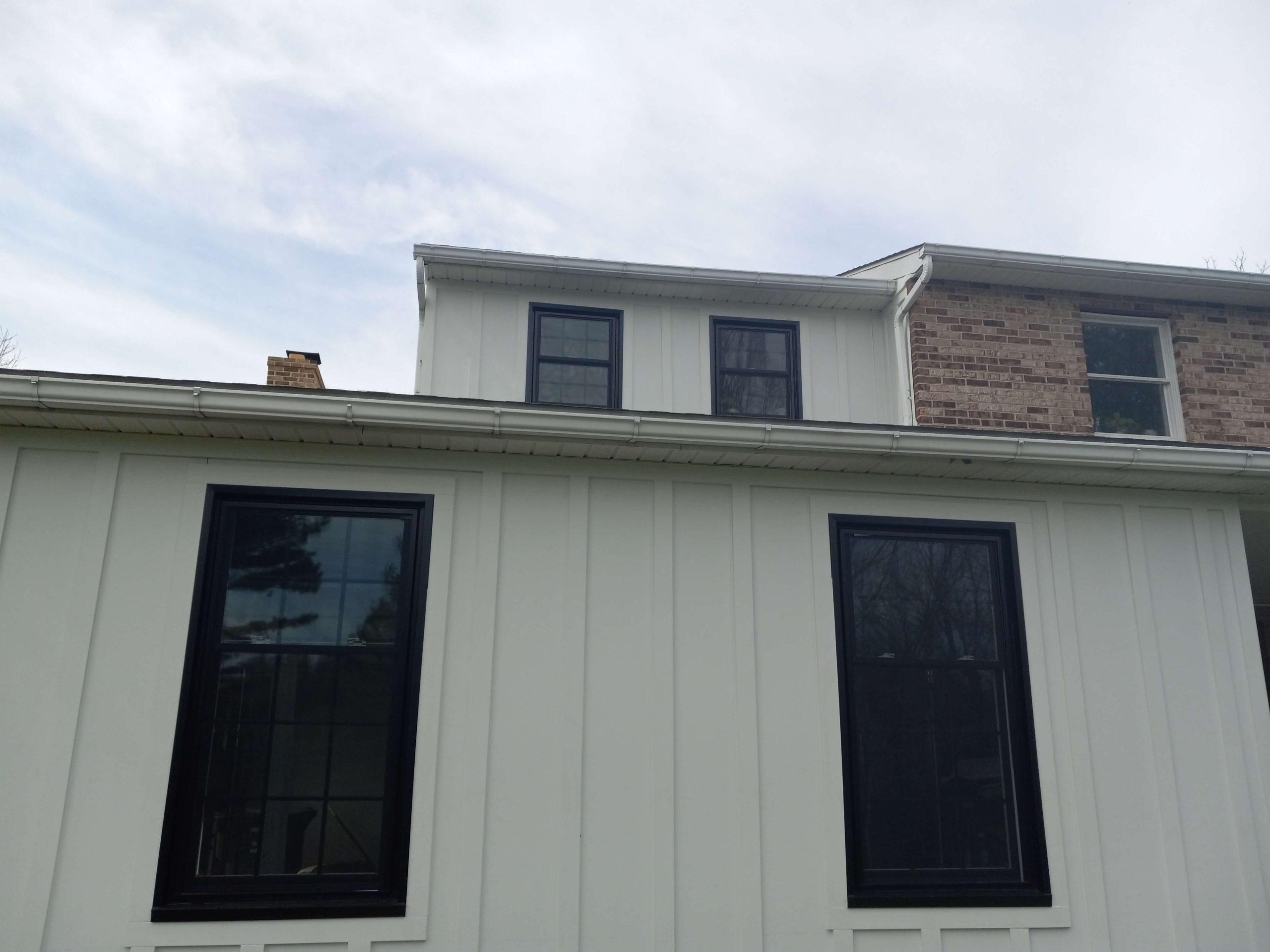 new first and second floor windows, tall windows with square panels