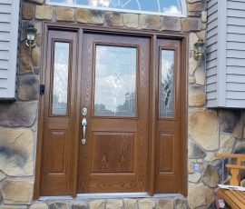 beautiful wood front door with diamond glass accents